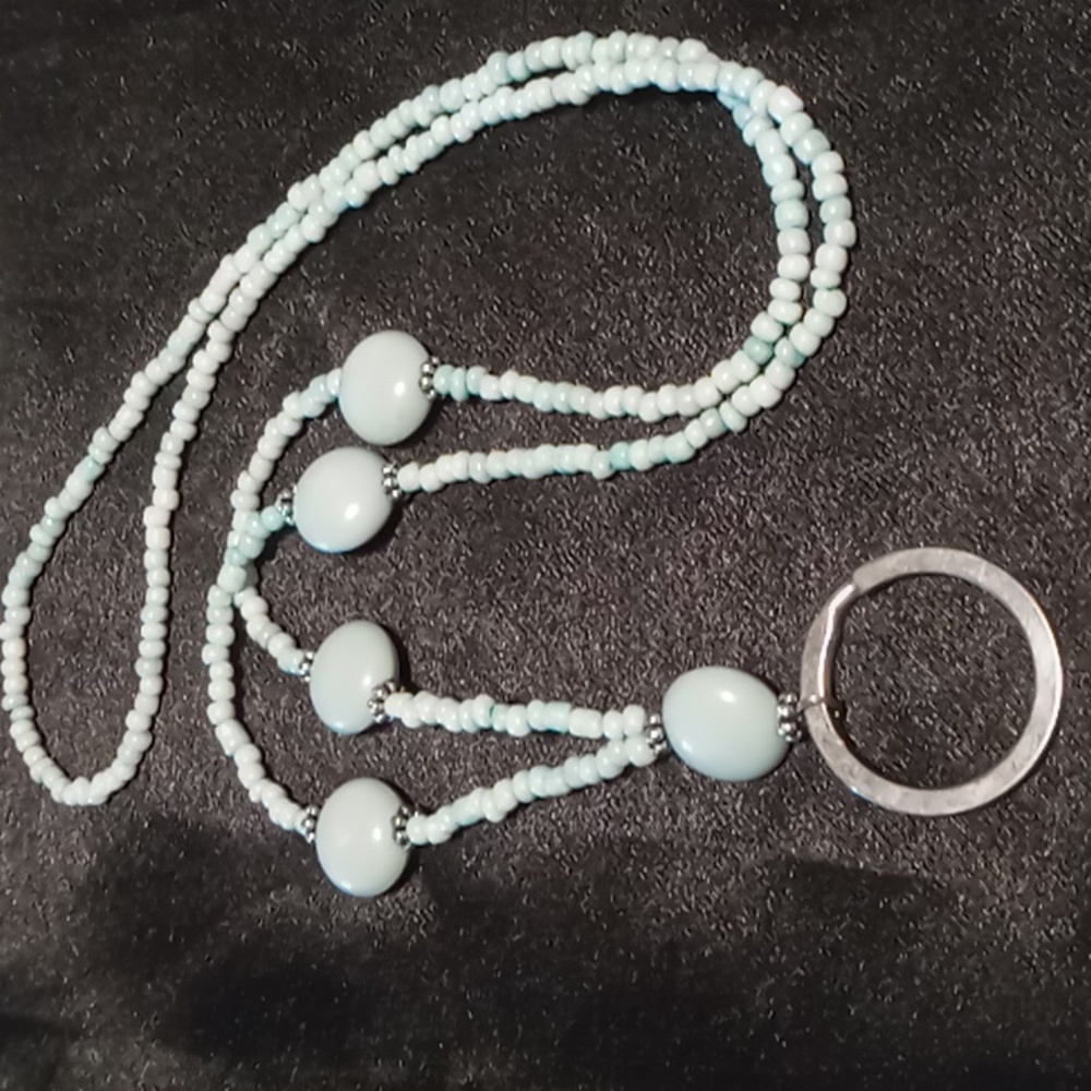 Beaded lanyard 34 inch s long glass seed beads larger resin beads. Key ring.